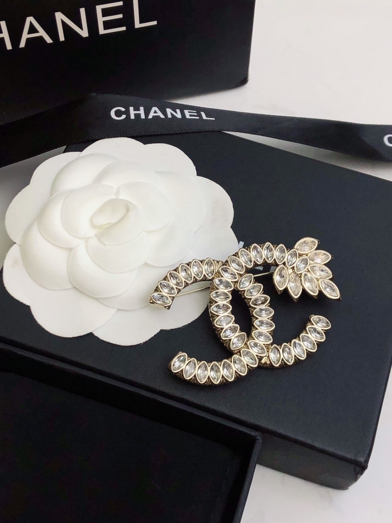 Ch**el brooches